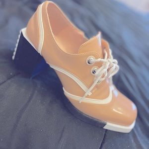 Shoes 8 1/2  tan, black, and white; runs small